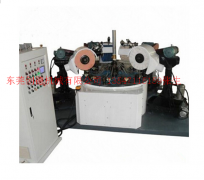 四頭(tóu)圓盤平弧面自(zi)動抛光機
